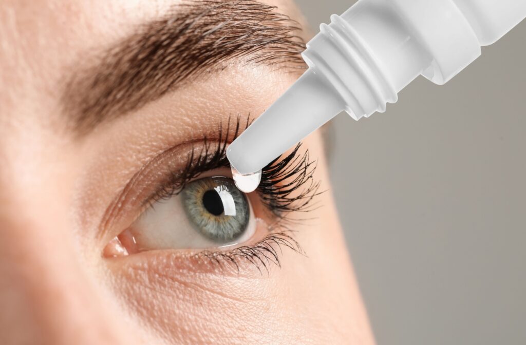 Close-up of eye receiving eye drops for dryness relief.