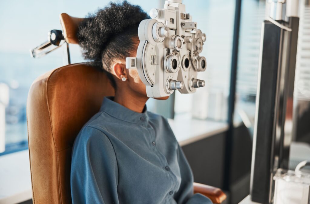 A person getting a test done to determine their eye prescription