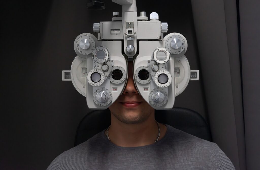 A person undergoing a prescription test during an eye exam