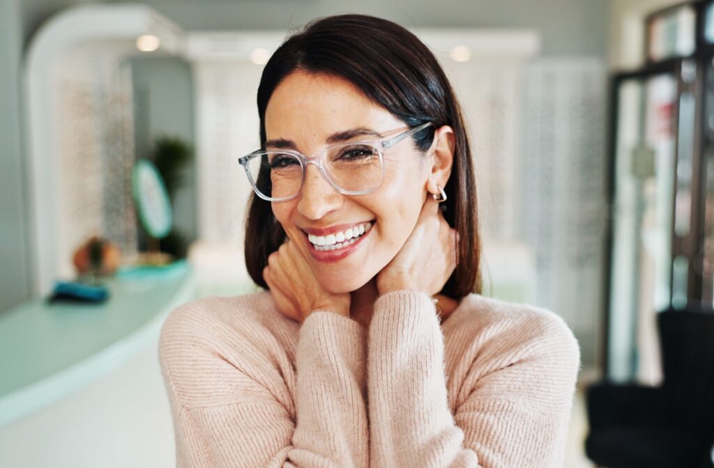 A person wearing glasses and smiling