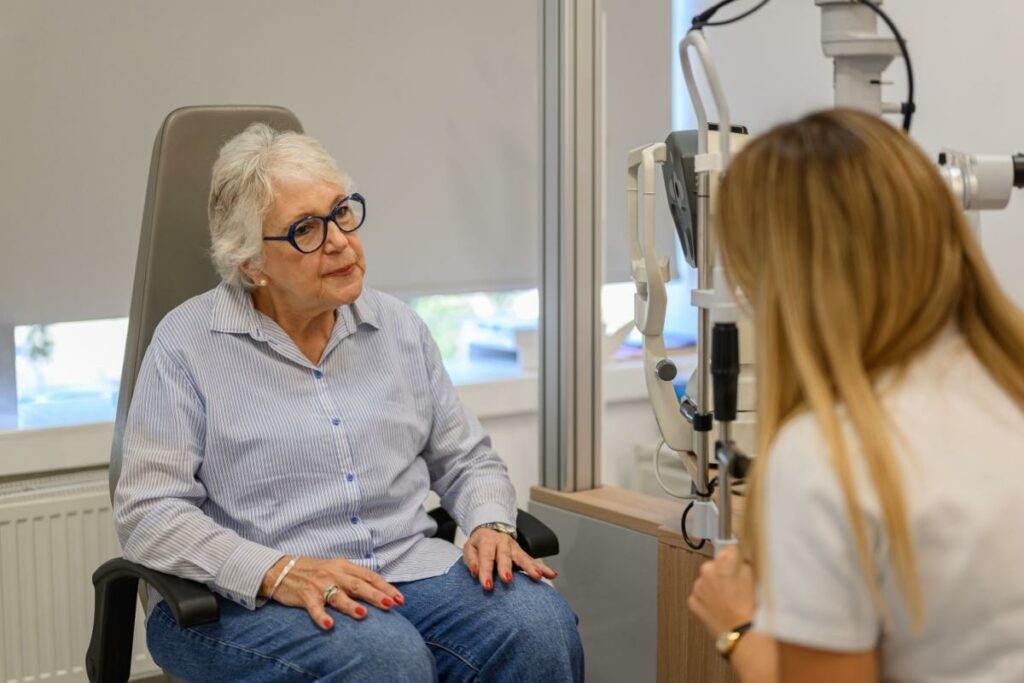 A senior person getting a routine eye exam done